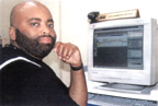 john at computer - small.JPG (10299 bytes)